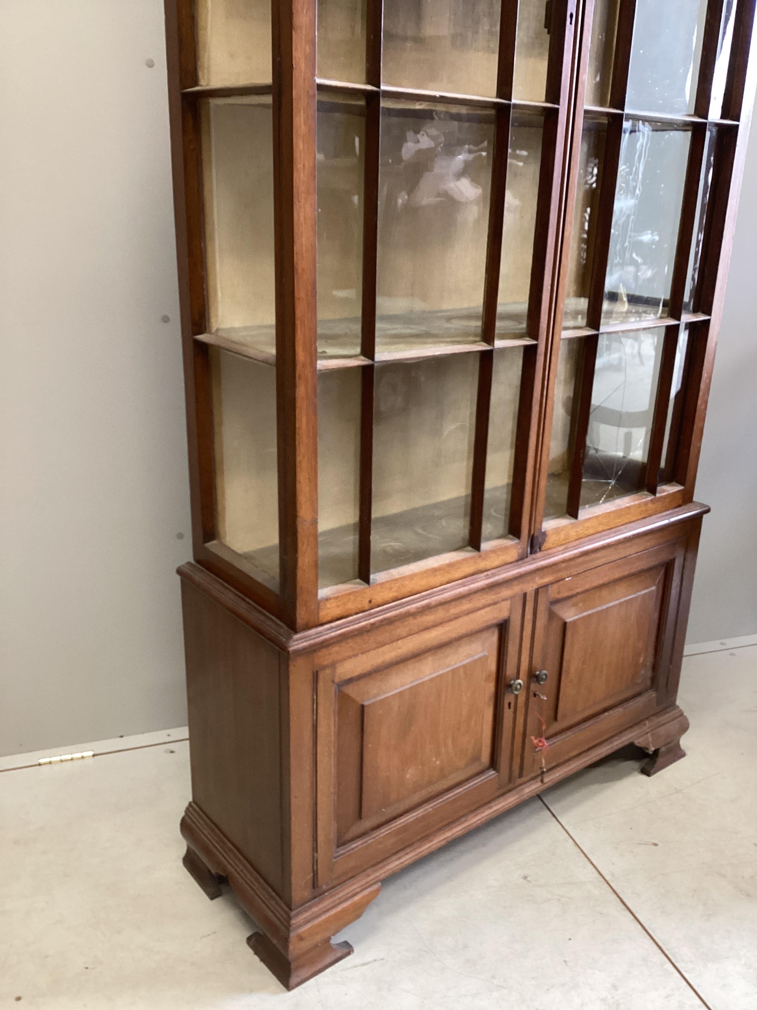An Edwardian mahogany display cabinet, width 106cm, depth 39cm, height 203cm